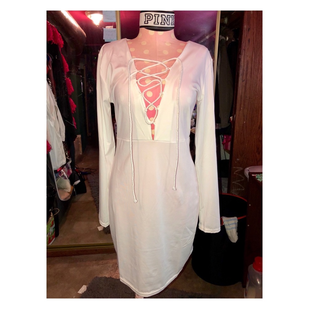 Laceup dress. Length: an inch or so above the knee